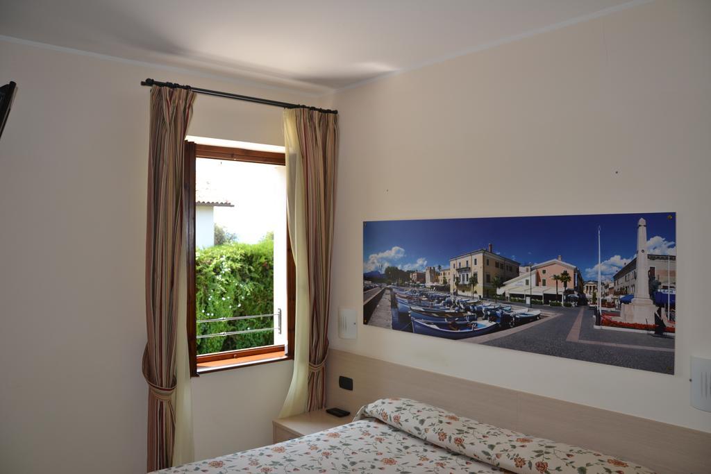 Locanda Le Palafitte Bardolino Habitación foto